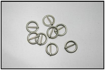 TIN RING BROOCHES